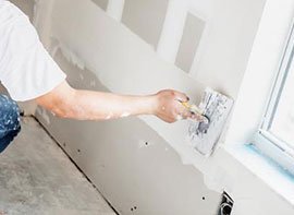Fresh plaster applied to an interior wall